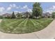 Charming home with a manicured lawn, mature trees, and an inviting entrance, set against a backdrop of blue skies and puffy clouds at 3270 Cherokee Cir, Bargersville, IN 46106