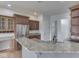 Spacious kitchen with granite countertops, stainless steel appliances, and custom cabinetry at 3270 Cherokee Cir, Bargersville, IN 46106
