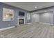 Finished basement with a modern fireplace and ample living space at 3270 Cherokee Cir, Bargersville, IN 46106
