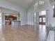 The great room features hardwood floors, an open floor plan, and leads to an elegant entryway and updated kitchen at 3270 Cherokee Cir, Bargersville, IN 46106