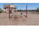 Community playground with swings, slide and playhouse at 3270 Cherokee Cir, Bargersville, IN 46106