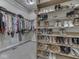 Spacious walk-in closet with custom shelving and hanging rods for ample storage of clothing, shoes, and accessories at 3270 Cherokee Cir, Bargersville, IN 46106