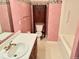 Bathroom with single vanity and tub shower at 3400 W Riggin Rd, Muncie, IN 47304