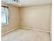 Bedroom with natural lighting, neutral walls, and carpeted floor at 3400 W Riggin Rd, Muncie, IN 47304