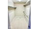 Walk-in closet with carpeted floors and shelving at 3400 W Riggin Rd, Muncie, IN 47304