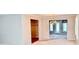 Open-concept dining room features an elegant chandelier and a back door at 3400 W Riggin Rd, Muncie, IN 47304