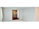 Spacious living room with a pass-through into the dining room for entertaining guests at 3400 W Riggin Rd, Muncie, IN 47304
