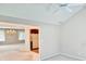 Open-concept living area with seamless flow to kitchen and adjacent rooms at 3400 W Riggin Rd, Muncie, IN 47304