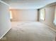 Spacious living room provides ample room for relaxing or entertaining guests at 3400 W Riggin Rd, Muncie, IN 47304