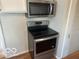 This kitchen features stainless steel appliances, including a modern oven and microwave at 5332 Fletcher Ave, Indianapolis, IN 46219