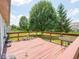 Outdoor deck overlooking a well-maintained yard, providing an ideal spot for leisure at 5548 Glen Canyon Dr, Indianapolis, IN 46237