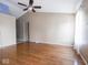 Spacious living room with a ceiling fan and hardwood floors at 5548 Glen Canyon Dr, Indianapolis, IN 46237