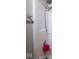Standard white shower featuring an adjustable shower head, soap dish, and grab bar at 5548 Glen Canyon Dr, Indianapolis, IN 46237