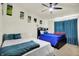 Spacious bedroom with ceiling fan, carpet and plenty of natural light at 6383 Enclave Blvd, Greenwood, IN 46143