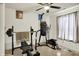 Home exercise room with weight lifting station, punching bag and elliptical at 6383 Enclave Blvd, Greenwood, IN 46143