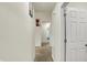 Bright hallway with neutral carpet leads to the other rooms of the home at 6383 Enclave Blvd, Greenwood, IN 46143