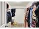 Walk-in closet with metal shelving and hanging storage at 6383 Enclave Blvd, Greenwood, IN 46143