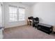 Bright bedroom features two windows and a desk at 7241 Glen Park Ln, Indianapolis, IN 46259