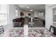 Well-lit dining area with views of kitchen and living room at 7241 Glen Park Ln, Indianapolis, IN 46259