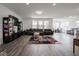Spacious living room featuring modern furnishings and an open-concept design with lots of natural light at 7241 Glen Park Ln, Indianapolis, IN 46259