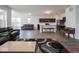 Expansive open-concept space with modern kitchen, living area, and abundant natural light at 7241 Glen Park Ln, Indianapolis, IN 46259