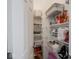 A pantry with metal shelving that is fully stocked with containers and appliances at 7241 Glen Park Ln, Indianapolis, IN 46259