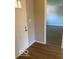 Bright foyer with hardwood floors and a view of the living area at 7313 Shanna Cir, Indianapolis, IN 46236