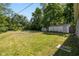 Large backyard with shed at 7424 North Dr, Lawrence, IN 46226