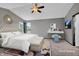 Virtual Staging: Elegant bedroom with a seating area and bright natural light at 793 Penny Ln, Pittsboro, IN 46167