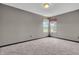 Carpeted bedroom with neutral walls, single window with valance allowing plenty of natural light at 793 Penny Ln, Pittsboro, IN 46167