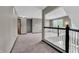 Hallway featuring multiple doors to bedrooms and stairwell at 793 Penny Ln, Pittsboro, IN 46167