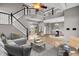 Staged living room with modern furnishings, light-filled rooms, and an open floor plan at 793 Penny Ln, Pittsboro, IN 46167