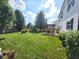 Expansive backyard with a pergola-covered patio area, perfect for outdoor dining and entertaining at 8433 Vyners Ln, Avon, IN 46123