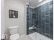 Modern bathroom showcasing a tiled shower with glass door, a toilet, and a minimalist design at 9124 Anthem Ave, Plainfield, IN 46168