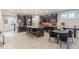 Open-concept kitchen and dining area showcases a large island and modern fixtures at 9124 Anthem Ave, Plainfield, IN 46168