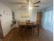 Comfortable dining area with a ceiling fan, table and seating, perfect for Gathering meals at 9783 Lee Ct, Columbus, IN 47203