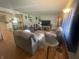 Cozy living room featuring comfortable seating and natural light, perfect for relaxation at 9783 Lee Ct, Columbus, IN 47203