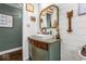 Bright bathroom featuring a chic vanity and shiplap accent wall at 3331 Loral Dr, Anderson, IN 46013