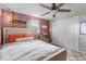 Comfortable bedroom featuring a ceiling fan, natural light, and closet at 3331 Loral Dr, Anderson, IN 46013