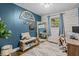 Cozy bedroom featuring stylish decor, a chic mirror, and a sunny window view at 3331 Loral Dr, Anderson, IN 46013