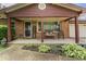 Charming front porch with comfortable seating and decorative accents, offering a warm welcome at 3331 Loral Dr, Anderson, IN 46013