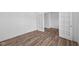 A bright bedroom with a stylish doorway and wood flooring at 3980 Canning St, Danville, IN 46122