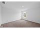 Bright bedroom with neutral carpet and a window providing natural light at 3980 Canning St, Danville, IN 46122