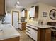 Bright kitchen featuring an island, updated appliances, and light countertops at 951 Plaza W Dr # 7B, Martinsville, IN 46151
