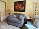Welcoming living room area featuring soft seating, lamps and accent tables at 951 Plaza W Dr # 7B, Martinsville, IN 46151