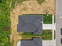 Overhead view of the home showcasing the roof, driveway, and the surrounding lot at 2184 Galleone Way, Plainfield, IN 46168
