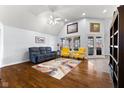 Spacious living room with hardwood floors, recessed lighting and comfortable seating at 6093 Boulder Ct, Columbus, IN 47201