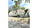 House with detached garage and driveway at 2709 E Troy Ave, Indianapolis, IN 46203