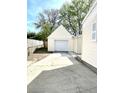 Detached single-car garage with driveway at 2709 E Troy Ave, Indianapolis, IN 46203