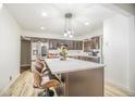Modern kitchen with quartz countertops, stainless steel appliances, and a stylish island at 2925 Highwoods Dr, Indianapolis, IN 46222